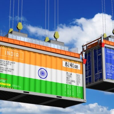 3D illustration of shipping containers flying the flags of India and the European Union